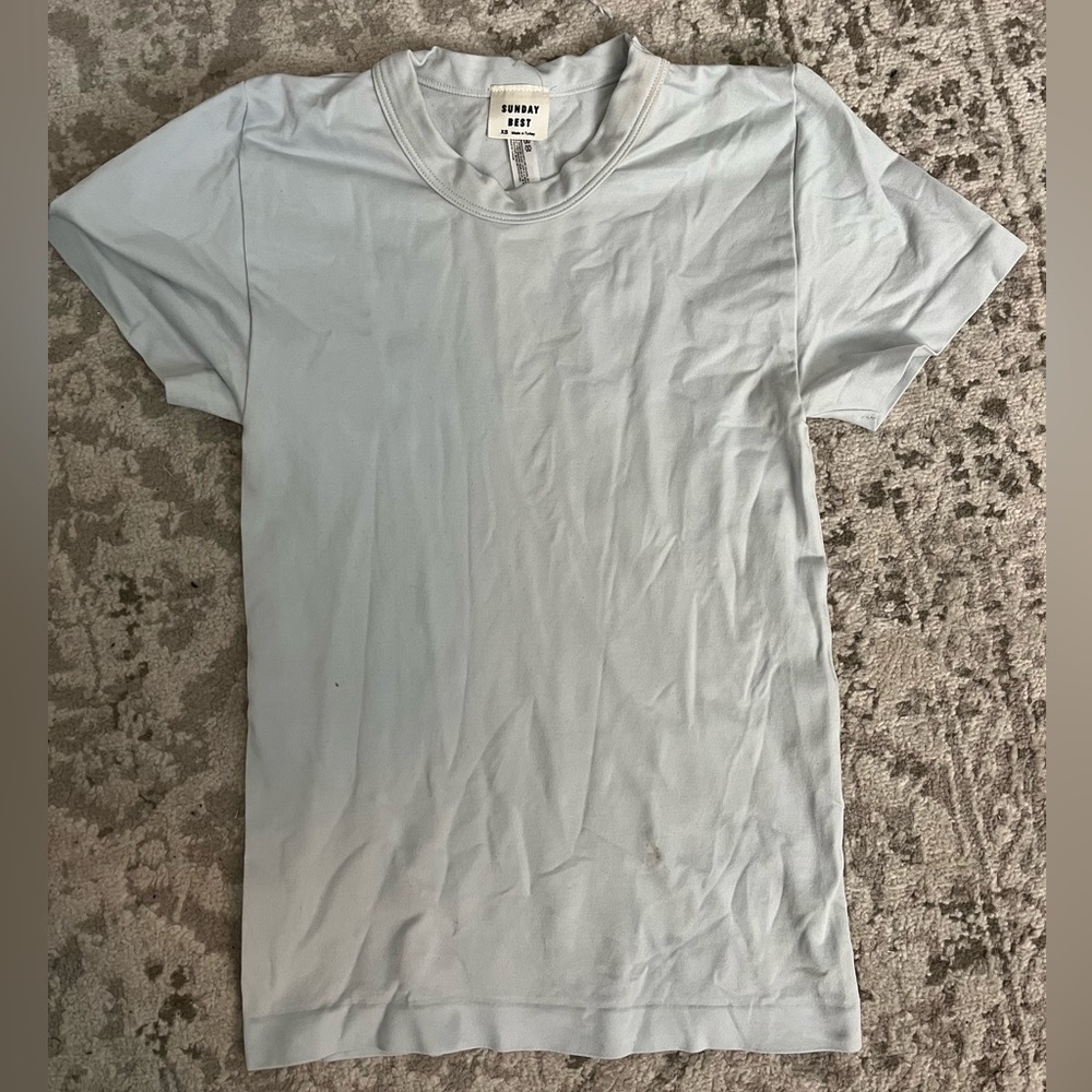 Sunday Best light blue spandex-like tee. Worn twice
